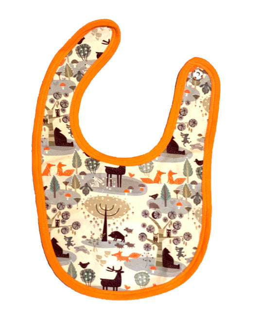 Lätzchen mit Waldmotiven in beige und orange aus Biobaumwolle 