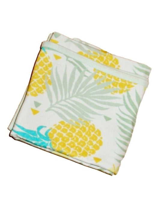 Weiße Babydecke aus Biobaumwolle mit gelb/grünem Ananas Motiv