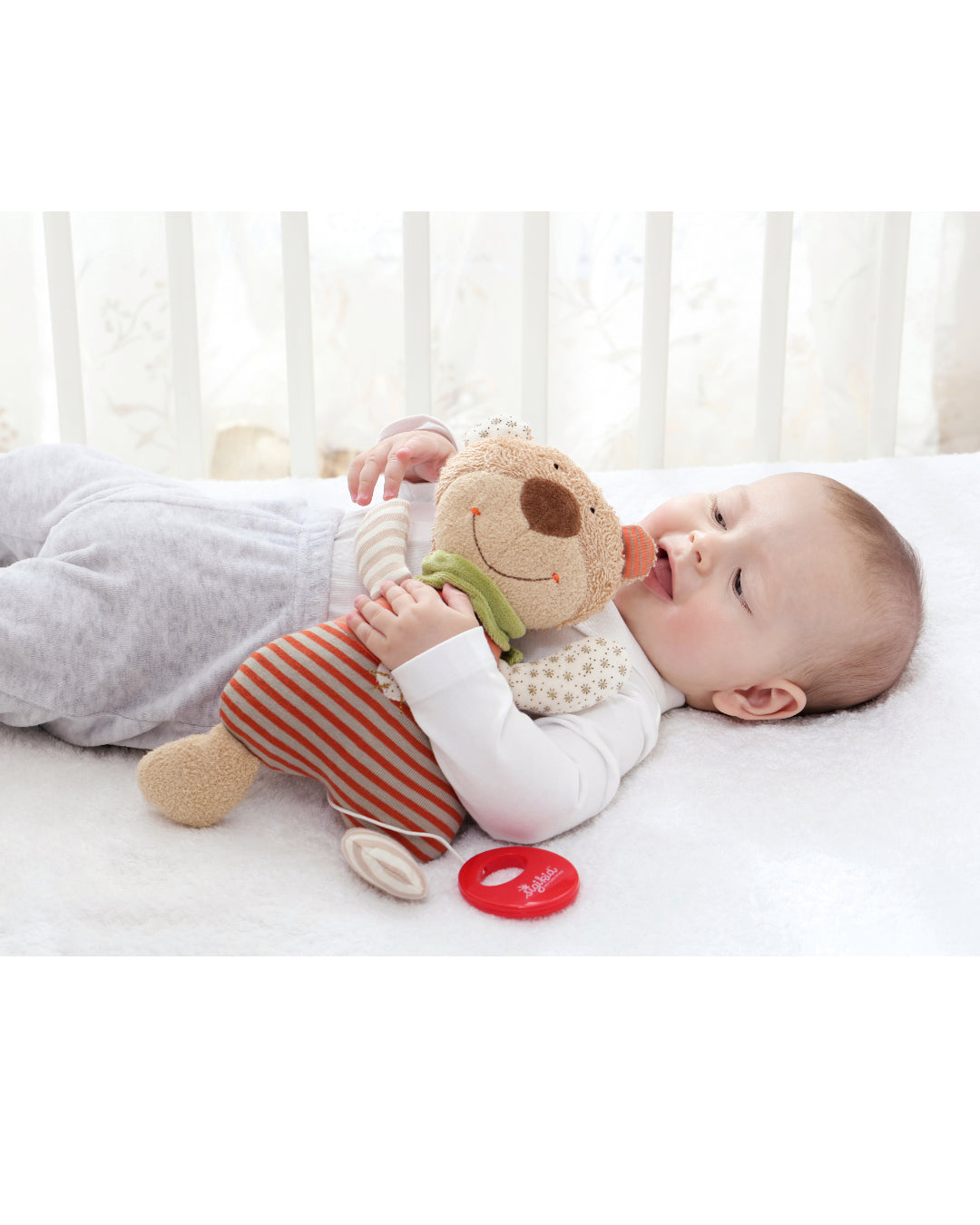 Baby mit Spieluhr Bär von sigikid